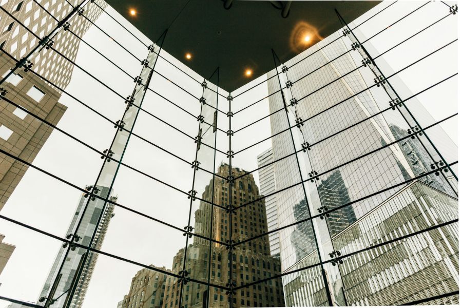 A view of a city through a glass wall